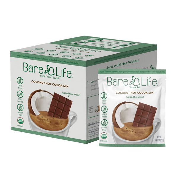 Bare Life coconut hot cocoa twenty-pack box beside a 0.95-ounce single-serving packet